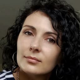 Олена Шолудько