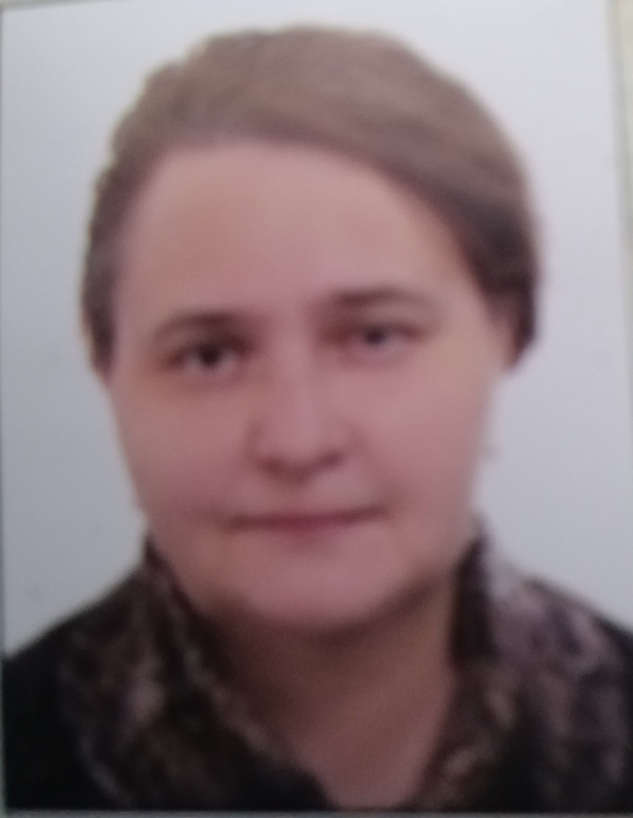Олена Кухар